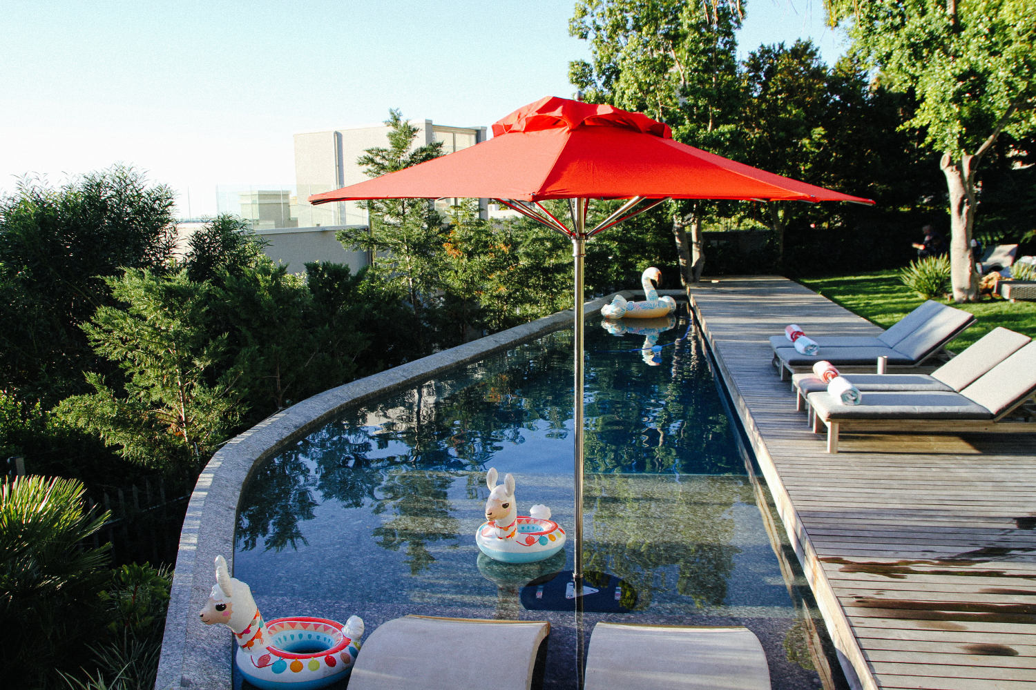 Outdoor Accessories That Make a Difference: Umbrellas, Rugs & More