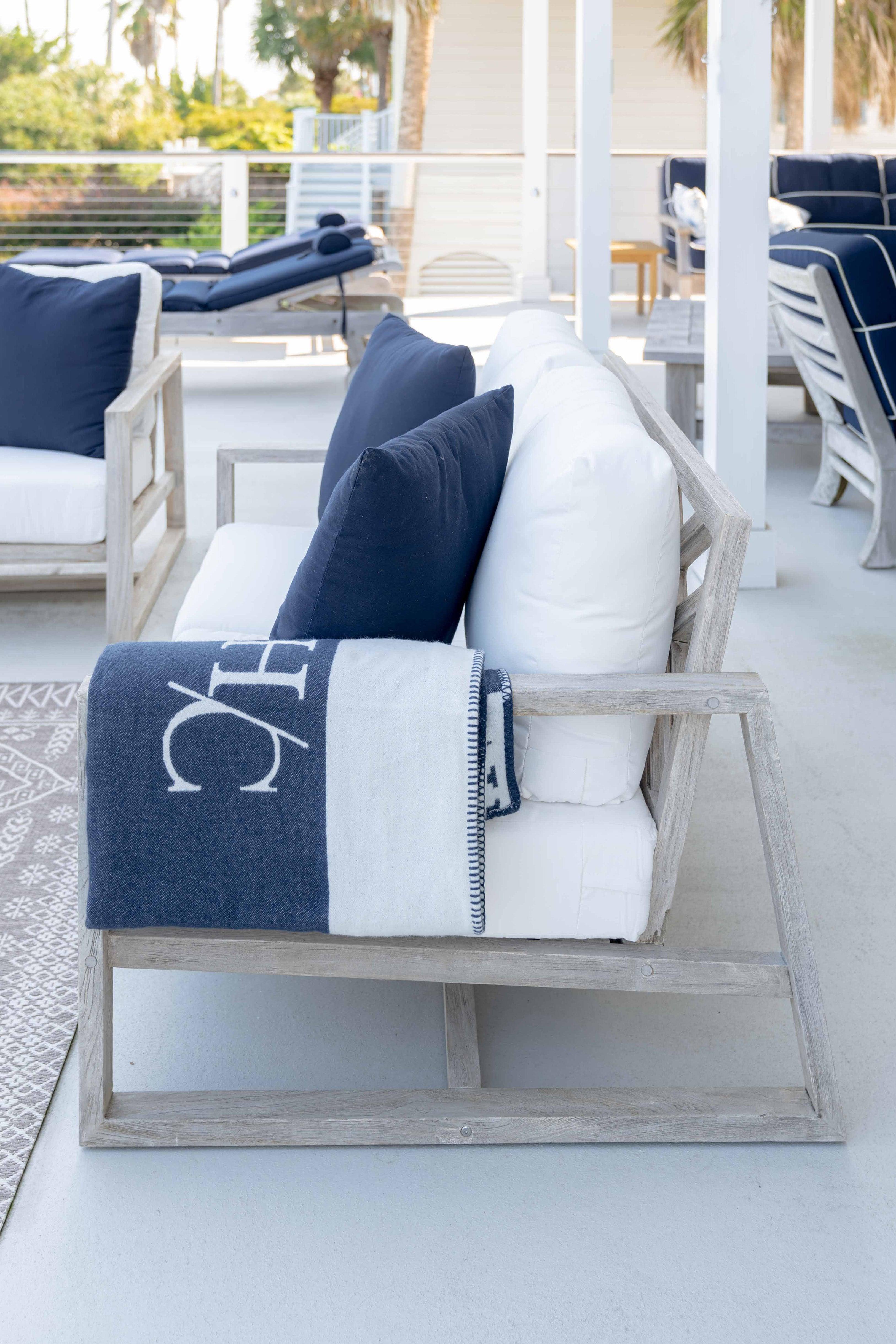 Grey wood patio loveseat